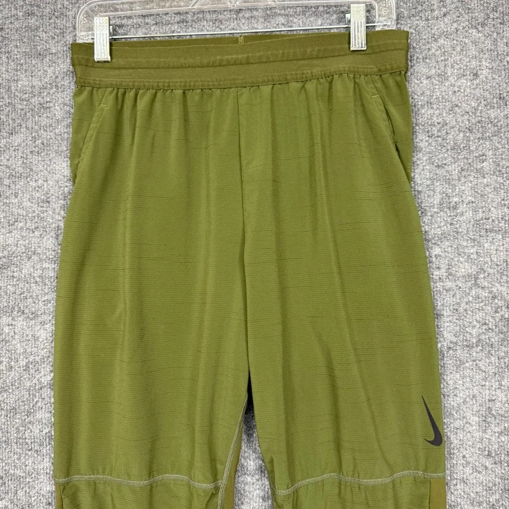 Nike Yoga Dri-FIT Jogger Pants Mens Small Olive Green Tapered CU7378-326